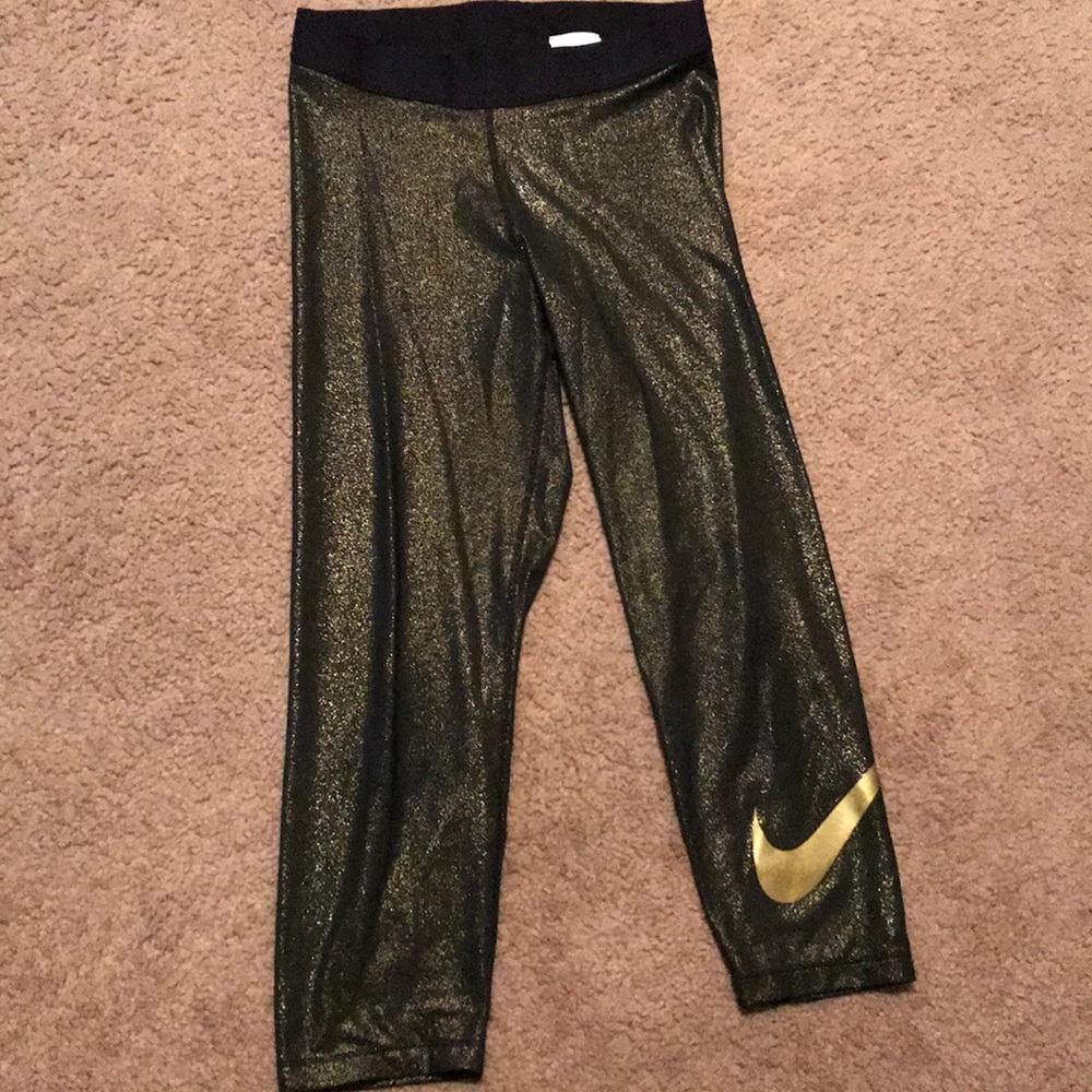 Black & gold Nike capris